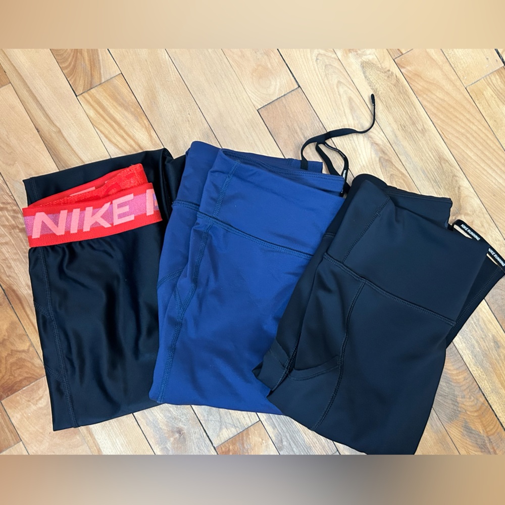 Nike Black and Blue Athletic Leggings Bundle Lot
Of Three